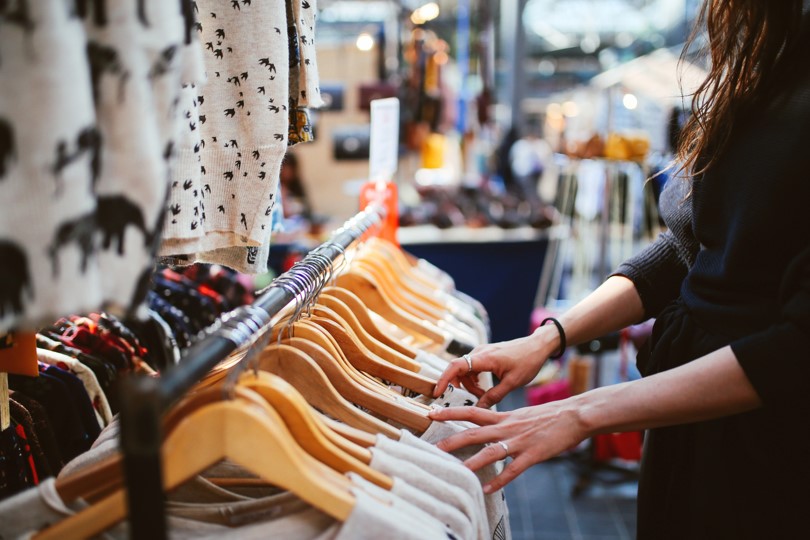 Clothing rail in a shop, illustrating more considered clothing choices